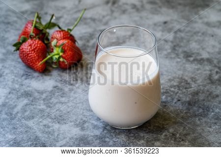 Kefir. Healthy Organic Drinkable Yogurt With Strawberries Fruit In Glass / Buttermilk Ayran.