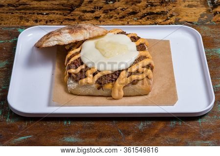 Ciabatta Baguette Sandwiches With Beef, Egg  And Vegetales.