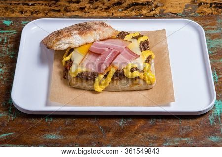 Ciabatta Baguette Sandwiches With Bacon, Cheese,  And Vegetales.