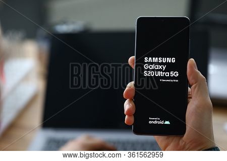Minsk, Belarus - 11 December 2019 : Male Hand Hold Samsung Galaxy S 20 Ultra. Illustrative Editorial