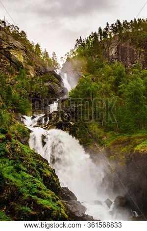 Norwegian Landscape. Waterfall Latefoss Latefossen, Odda Hordaland County In Norway. National Touris