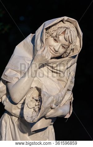 Bucharest, Romania - May 24,2018, Concordia, Woman Holding A Basket Of Fruits, Artel Myth Ukraine, L