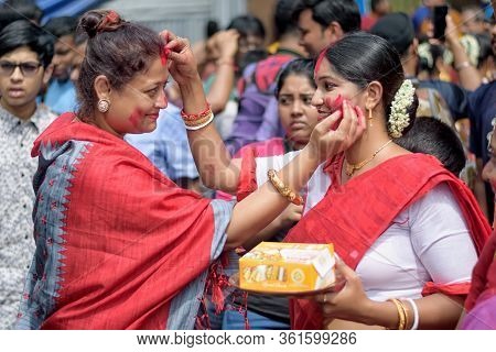 Women Participate In Sindur Khela At A Puja Pandal On The Last Day Of Durga Puja At Baghbazar Sarboj