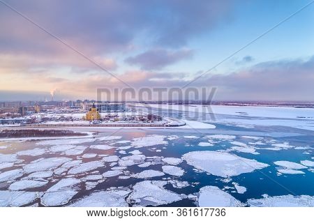 Spring Ice Drift In Nizhny Novgorod, On Strelka, The Confluence Of The Oka And Volga. Shooting From 