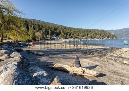 North Vancouver, Bc, Canada - Apr 11, 2020: People Outside At The Park In Deep Cove During The Covid