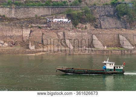 Baidicheng, China - May 7, 2010: Qutang Gorge On Yangtze River. Closeup Of Small Green-white Boat On