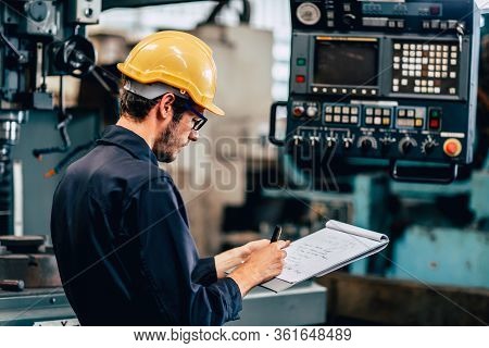 Young Profession Technician Engineer Operate Heavy Machine To Automated Cnc In Factory, Worker With 