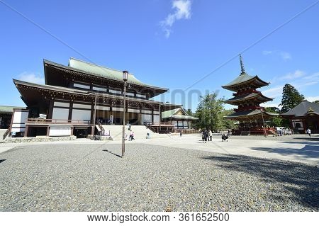 Narita, Japan - October 4, 2019: Tourist Walk Around Naritasan Temple With Red Pagoda In Naritasan S