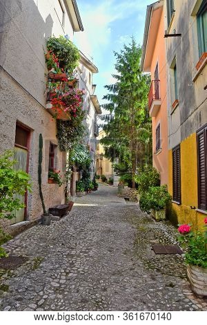 A Narrow Street Between The Old Houses Of Atina, A Medieval Village In The Province Of Frosinone