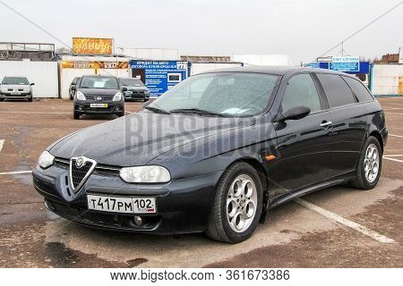 Ufa, Russia - April 19, 2012: Black Estate Car Alfa Romeo 156 In The City Street.