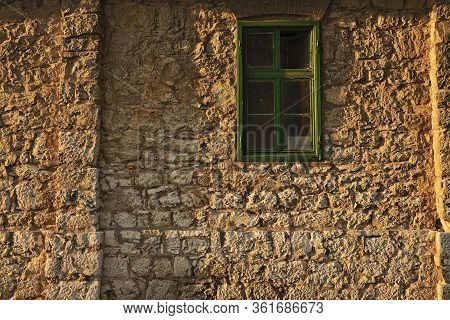 Old Traditional House Facade With Stone Wall, Caransebes, Romania