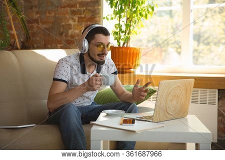 Remote Meeting. Man Working From Home During Coronavirus Or Covid-19 Quarantine, Remote Office Conce