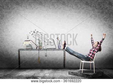 Young Happy Woman Relaxing In Room. Creative Freelance Designer Sitting On Chair And Putting Feets O