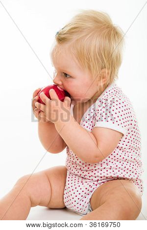 Cute Infant Girl Learining To Eat With Spoon