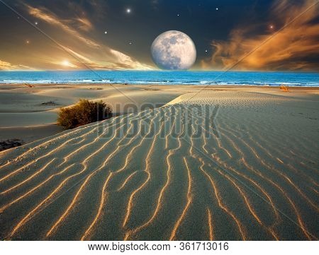 Fictional Fantasy Landscape View Of The Surface Of Another Planet, On A Background Of Sky And Satell