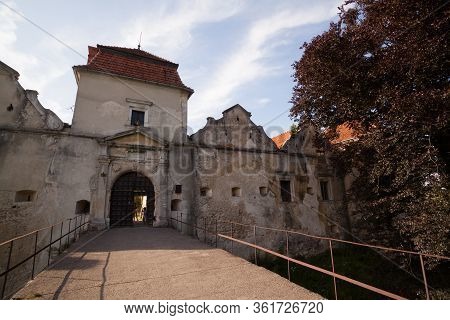 Svirzh, Ukraine - July 23 2009: Famous Ukranian Landscape. Facade Of The Medieval Castle Svirzh, Lvi