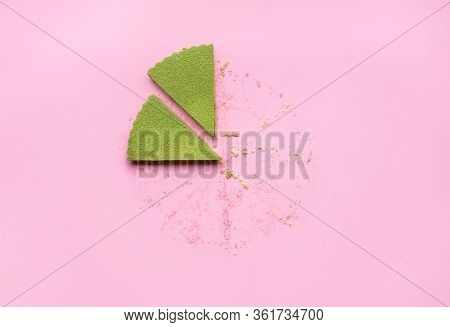 Two Slices Of Matcha Cheesecake Top View On A Pink Background. Cheesecake Made With Matcha Green Tea