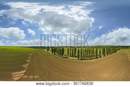 Aerial View Of Panorama Of Brown Fields And Farmland.