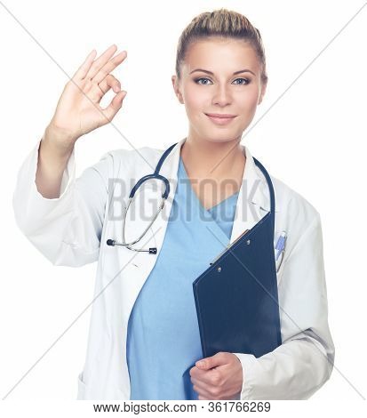 A Female Doctor Shows A Sign Okay With Folder Isolated On White Background.