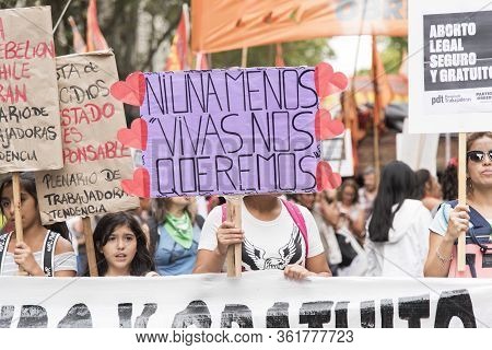Caba, Buenos Aires / Argentina; March 9, 2020: International Womens Day. A Group Of Women Holding Po