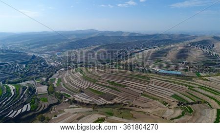 Aerial View Of Terraced Farm Field Mass Production During Summer Dry Season In Tianshui, Gansu Provi