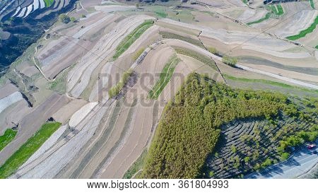 Aerial View Of Terraced Farm Field Mass Production During Summer Dry Season In Tianshui, Gansu Provi