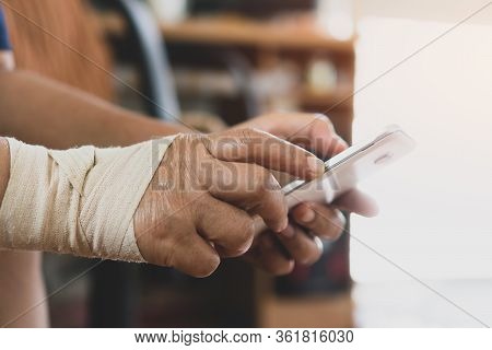Trigger Finger Or Finger Lock Disease, Office Syndrome Technology Concept. Businessman Trying Use Sm