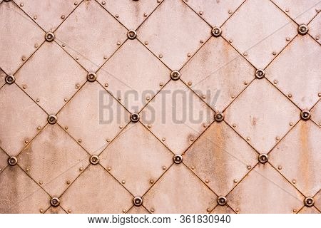 Medieaval Pattern On An Old Metal Door. Abstract Texture.