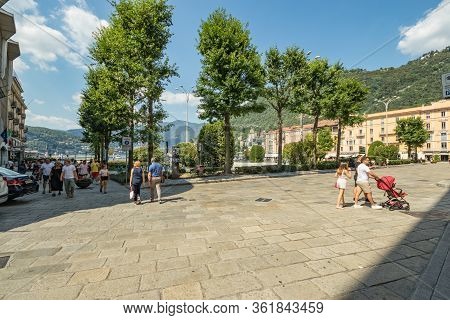 Como, Italy - August 4, 2019: Local People And Tourists On A Quiet Cozy Streets In The Center Of Bea