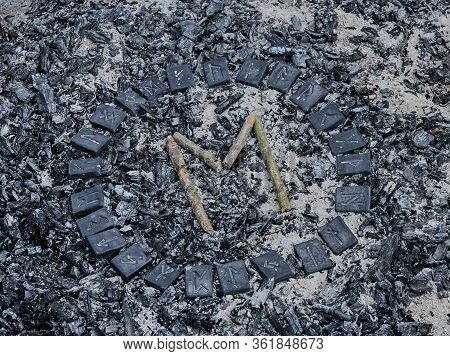 Norse Rune Ehwaz On Ashes Backgorund Inside The Circle Of 24 Norse Runes