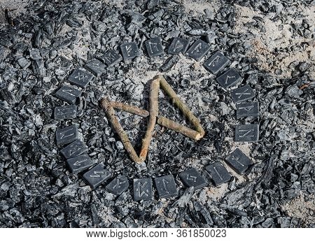 Norse Rune Dagaz On Ashes Backgorund Inside The Circle Of 24 Norse Runes