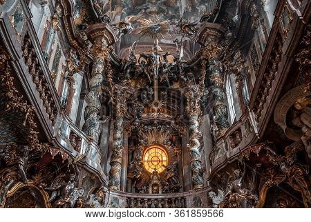 Feb 2, 2020 - Munich, Germany: Ornate Second Floor Of Altar With Crucifix Inside Baroque Church Asam