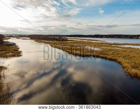 River Lielupe Areal View On A Sunny Spring Day With Cloudy Sky. Photo Taken In Latvia.