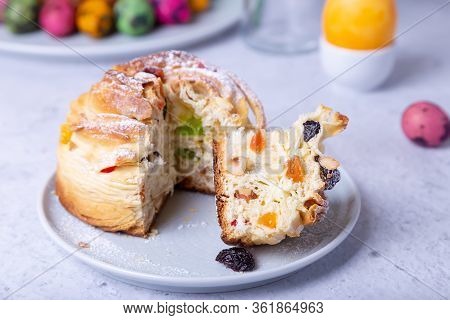 Craffin (cruffin) With Raisins, Nuts And Candied Fruits. Easter Bread Kulich And Painted Eggs. Easte