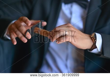 Cigar Pruning. Cigar On Hands Close-up, Dressing, Mans Style, Stylish Man. Elegant Young Handsome Ma