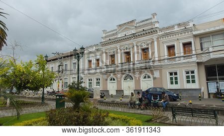 Cayambe, Pichincha / Ecuador - February 24 2020: Cars Circulating In Front Of The Municipal House Of