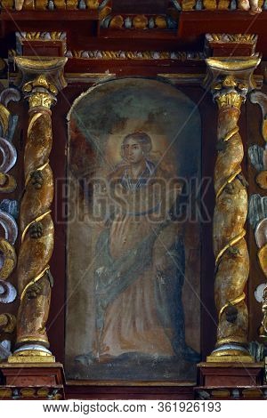 LAZ, CROATIA - JULY 14, 2014: St. Barbara altarpiece at St. Andrew's Church in Laz, Croatia