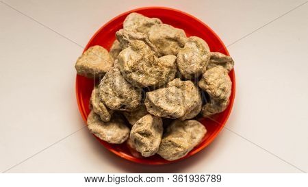 Pile Of Raw Asam Boi Or Sour Plum On Red Bowl On White Background.