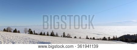 Sea Of Fog Over The Weissenstein Mountain With The Alps Range In The Far View, Solothurn, Switzerlan
