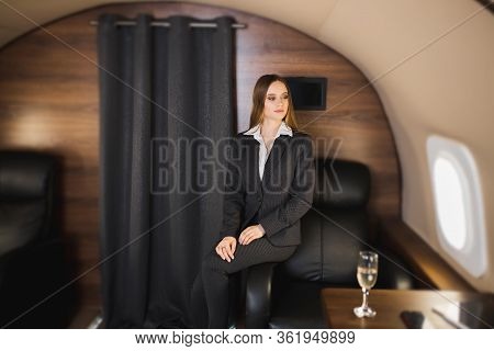 Attractive Woman In Private Jet
