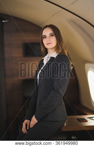 Attractive Woman In Private Jet