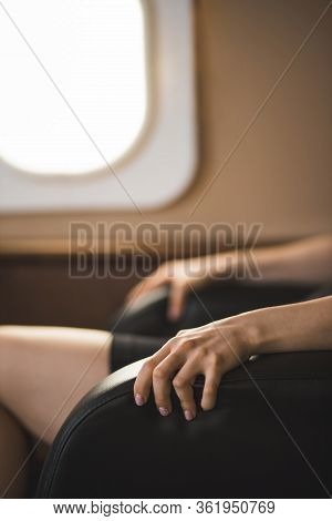 Attractive Woman In Private Jet