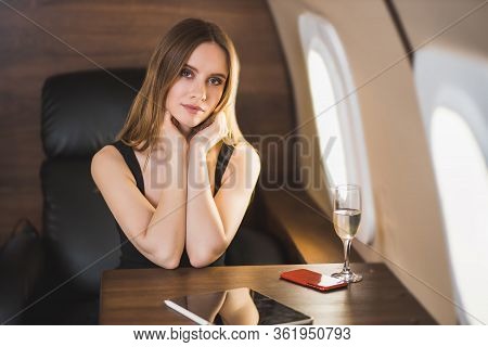 Attractive Woman In Private Jet