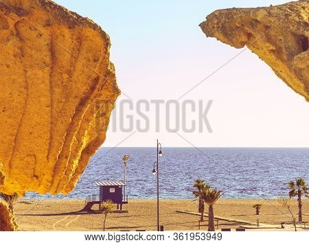 Famous Rock Erosion Formations Along Beach In Bolnuevo, Near Mazarron. Yellow Sandstone Shapes. Murc