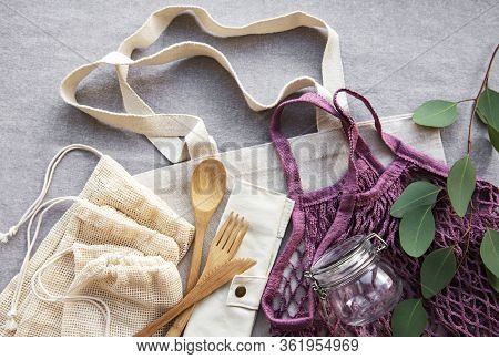 Net Bag With Reusable  Glass Jars, Fruits And Bamboo Cutlery. Zero Waste Concept. Eco Friendly. Flat