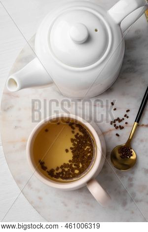 Tray With Freshly Made Buckwheat Tea On White Wooden Table, Top View