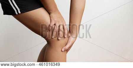 Woman Hand Massage Physiotherapy Her Knee Is Sore And Numb, Exhausted, Tingling. Guillain-barre Synd