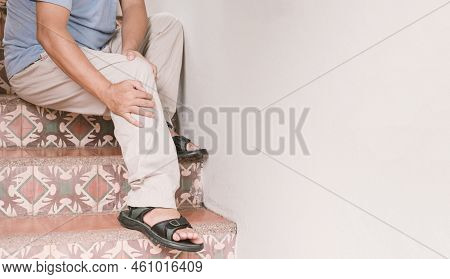 Man Hand Massage Physiotherapy Leg Is Sore And Numb, Exhausted, Tingling. Guillain-barre Syndrome, A