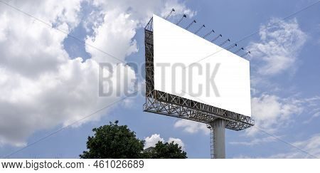 Mockup Large Billboard Or Poster Displayed On The Outdoor Against The Blue Sky Background. 3d Render