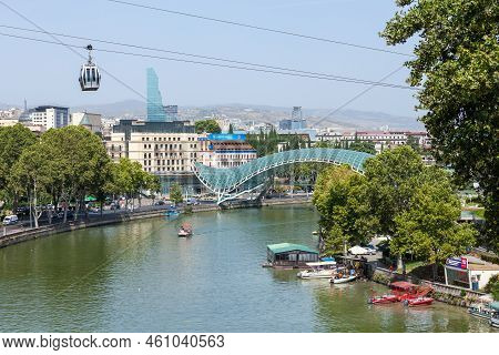 Tbilisi, Georgia - 22 August, 2022: The View On The Peace Bridge From Metekhi Church. Travel